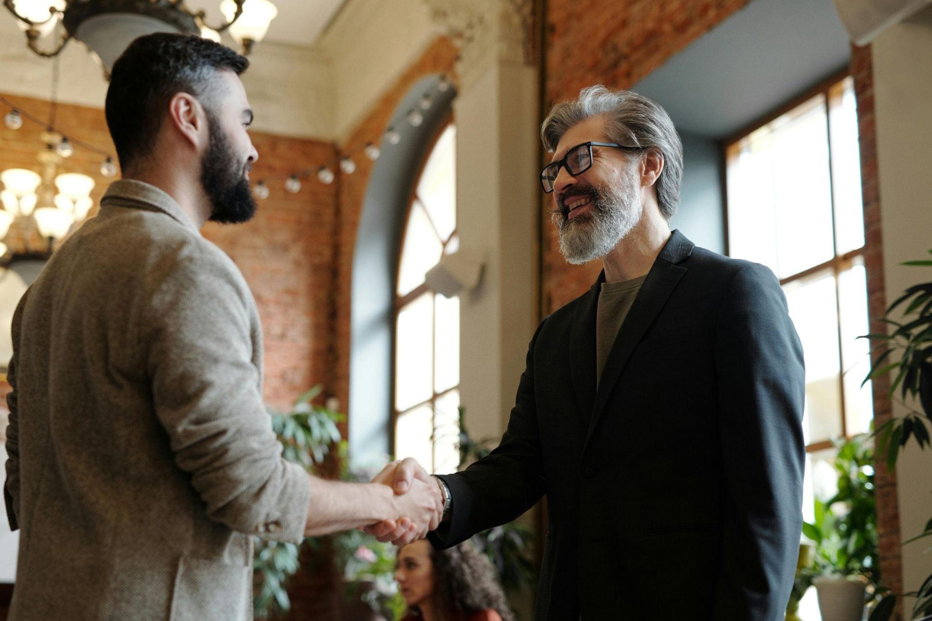 two men greeting each other